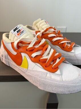 Nike White Sneakers with Orange Overlays and Yellow Swoosh